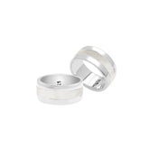 Handcrafted sterling silver wide band ring with luminous Mother of Pearl inlay, unisex artisan jewelry for everyday wear or gifting.